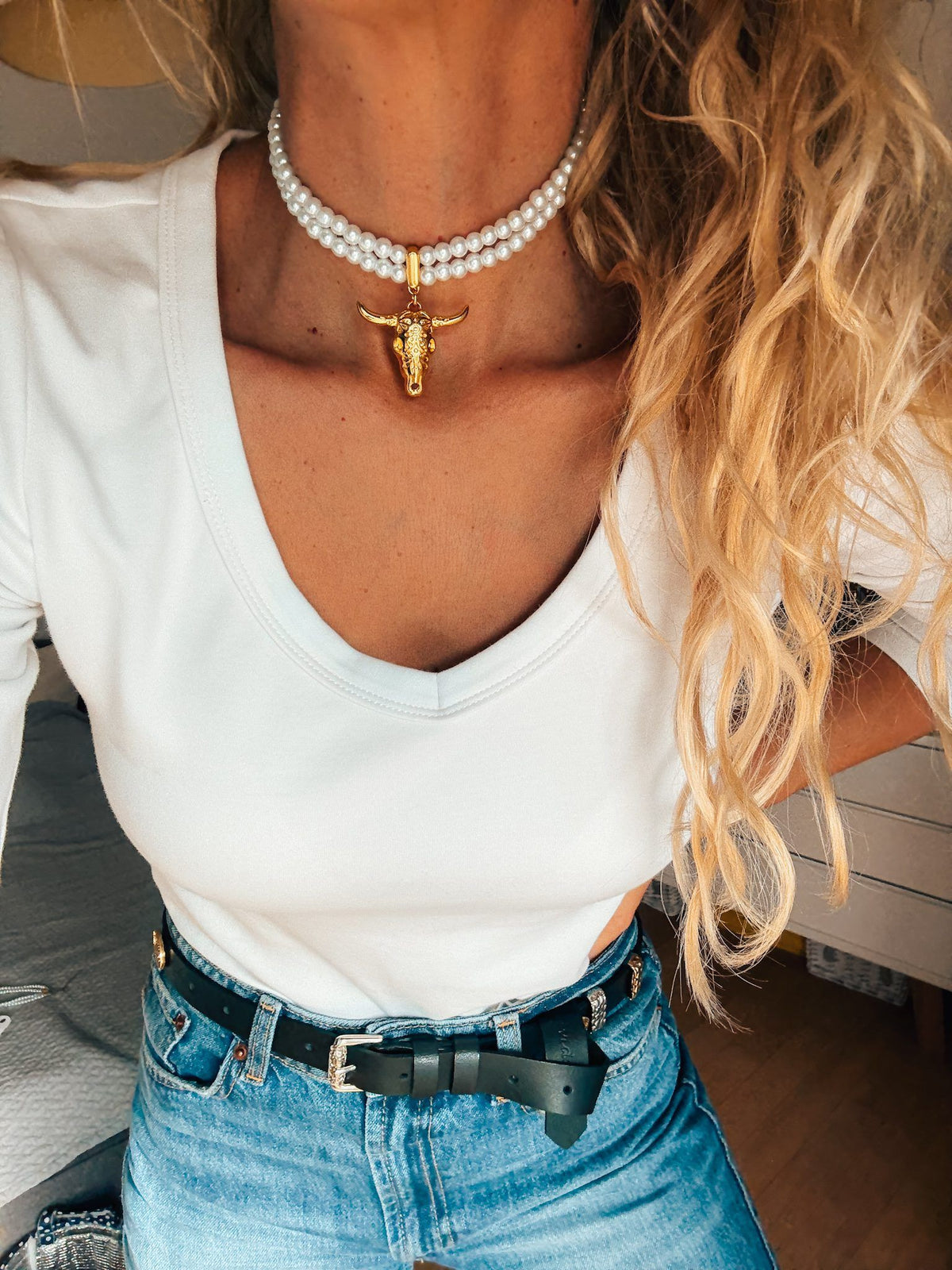 Double pearl choker with gold bull skull