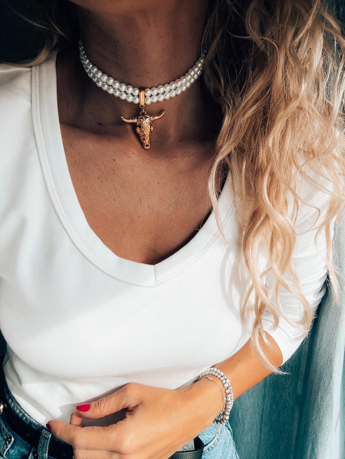 Double pearl choker with gold bull skull